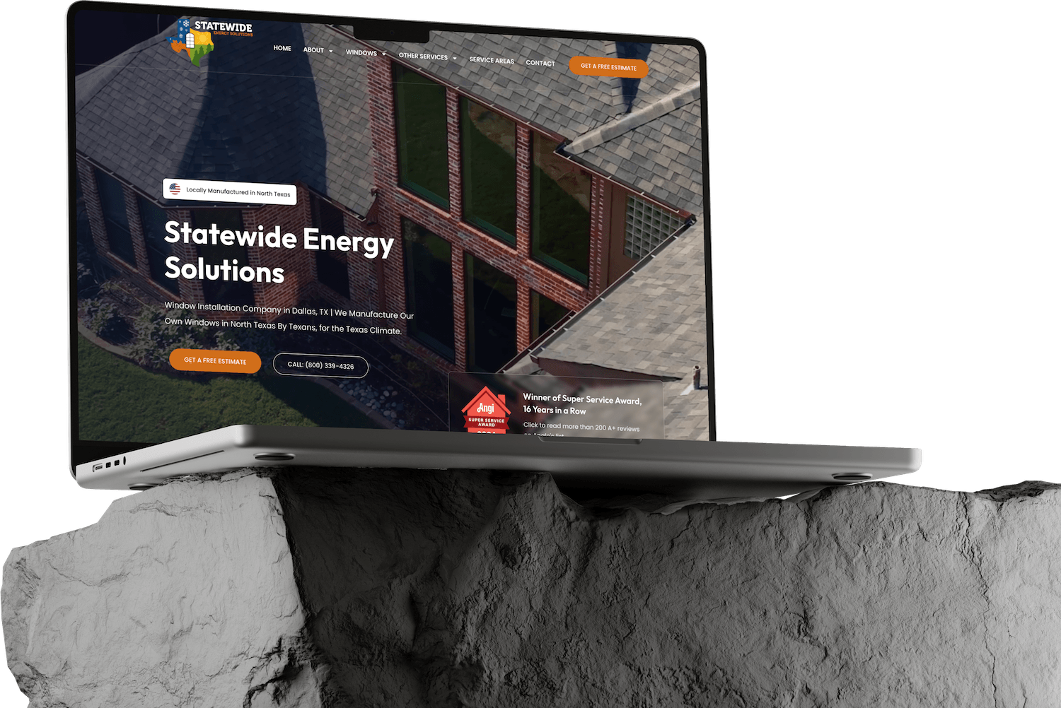 A laptop displaying the Statewide Energy Solutions website sits on a rough, gray stone surface. The site, created using expert Website Builds, features information about window installation services in Texas.