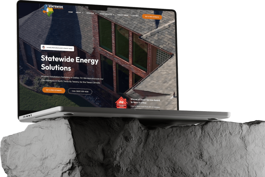 A laptop rests on a large rock slab. The screen displays Statewide Energy Solutions’ homepage in dark mode—a sleek example of professional website builds for this window installation company, complete with contact info and service details.