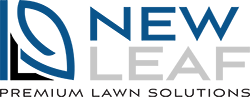 Logo for “New Leaf Premium Lawn Solutions” featuring a stylized blue and black leaf design on the left, with the company name in bold blue and gray text on the right.